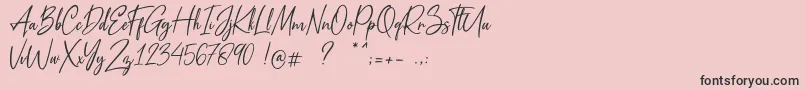 フォントMetal Pen – ピンクの背景に黒い文字