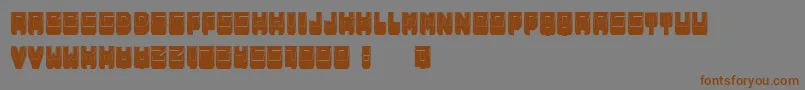 Шрифт MetallicShadowFilled – коричневые шрифты на сером фоне