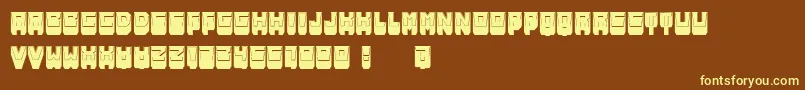 MetallicShadowFilled-fontti – keltaiset fontit ruskealla taustalla