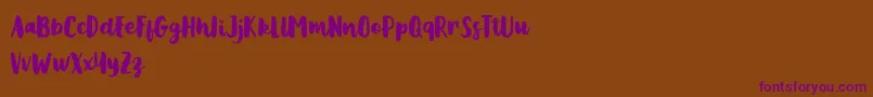 Metasha Font – Purple Fonts on Brown Background