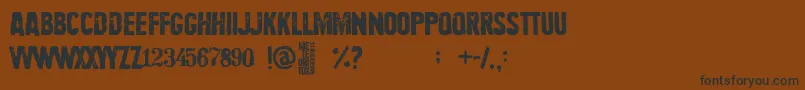 Meteoritox Font – Black Fonts on Brown Background