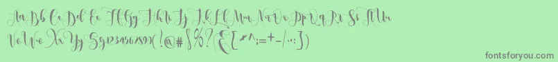 フォントmetic – 緑の背景に灰色の文字