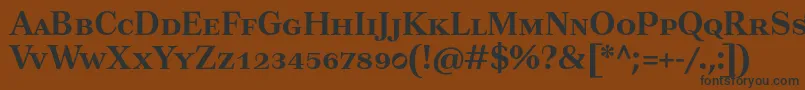 フォントTusartextscBold – 黒い文字が茶色の背景にあります