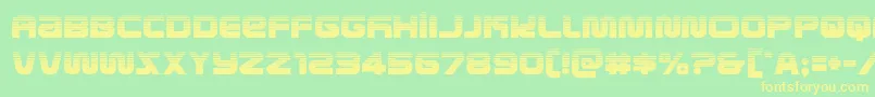 フォントmetronautshalf – 黄色の文字が緑の背景にあります