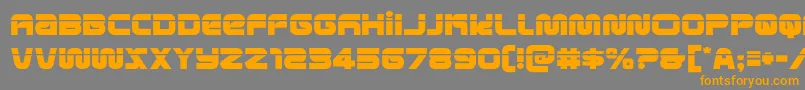 フォントmetronautslaser – オレンジの文字は灰色の背景にあります。
