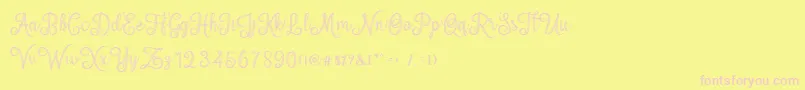 mettical-fontti – vaaleanpunaiset fontit keltaisella taustalla