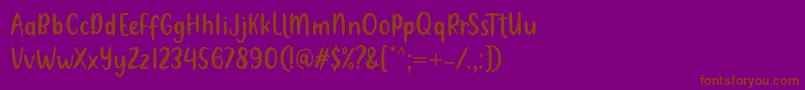 Metultah Regular Font by 7NTypes Font – Brown Fonts on Purple Background