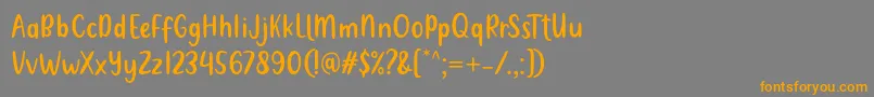 Więcej informacji o czcionce Metultah Regular Font by 7NTypes Czcionka Metultah Regular Font by 7NTypes – pomarańczowe czcionki na szarym tle