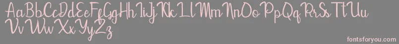Mevally-Schriftart – Rosa Schriften auf grauem Hintergrund