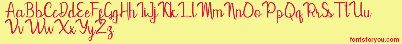 Mevally Font – Red Fonts on Yellow Background