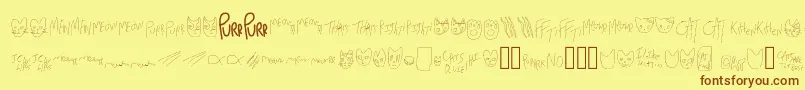 フォントMewTooCatDings – 茶色の文字が黄色の背景にあります。