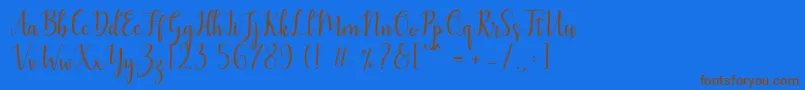Mezabetto Font – Brown Fonts on Blue Background