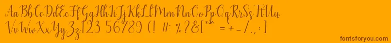 Mezabetto Font – Brown Fonts on Orange Background