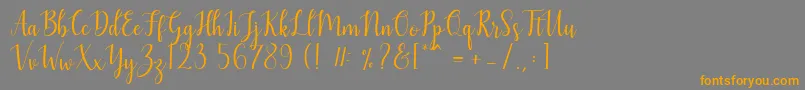 Mezabetto Font – Orange Fonts on Gray Background
