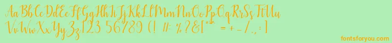 Mezabetto Font – Orange Fonts on Green Background