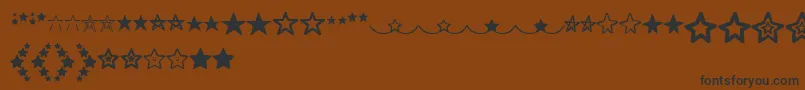 Шрифт MF Star Dings   – чёрные шрифты на коричневом фоне