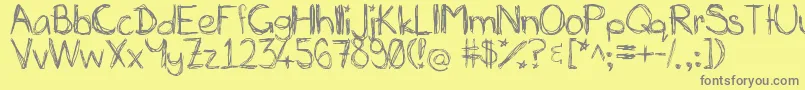 Fonte MiasScribblings~ – fontes cinzas em um fundo amarelo