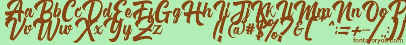 Fonte Michail Script FPU – fontes marrons em um fundo verde