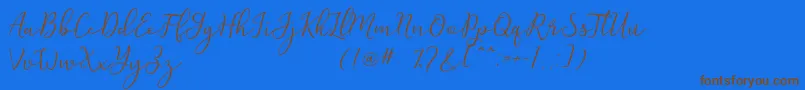 Michel Flow Dafont-Schriftart – Braune Schriften auf blauem Hintergrund