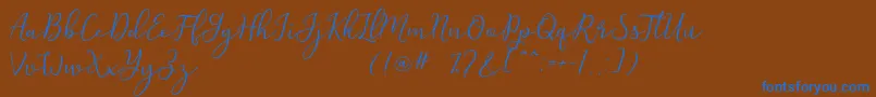 Michel Flow Dafont-Schriftart – Blaue Schriften auf braunem Hintergrund