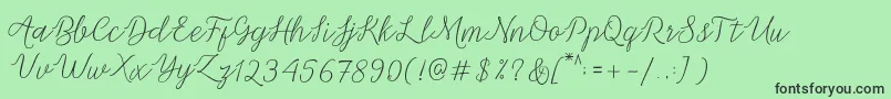 Fonte Michella Script – fontes pretas em um fundo verde