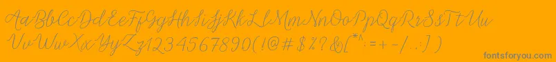 Michella Script-Schriftart – Graue Schriften auf orangefarbenem Hintergrund