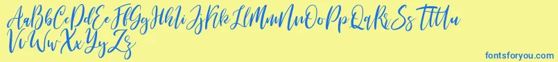 Michelles free Font – Blue Fonts on Yellow Background