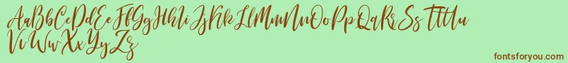 Michelles free Font – Brown Fonts on Green Background
