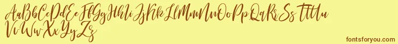 Fonte Michelles free – fontes marrons em um fundo amarelo