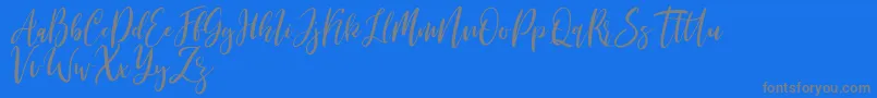 Michelles free-Schriftart – Graue Schriften auf blauem Hintergrund