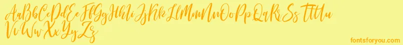 Michelles free Font – Orange Fonts on Yellow Background