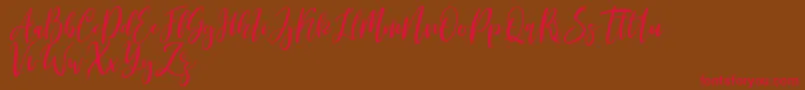Michelles free Font – Red Fonts on Brown Background
