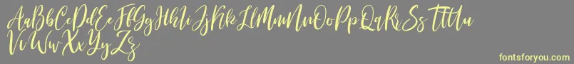 Michelles free-Schriftart – Gelbe Schriften auf grauem Hintergrund