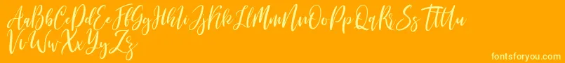 フォントMichelles free – オレンジの背景に黄色の文字