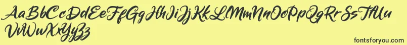 Mickey Steward-Schriftart – Schwarze Schriften auf gelbem Hintergrund