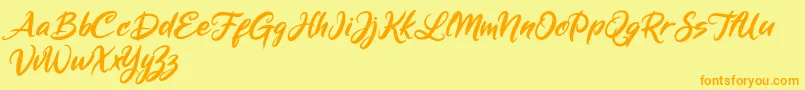 フォントMickey Steward – オレンジの文字が黄色の背景にあります。