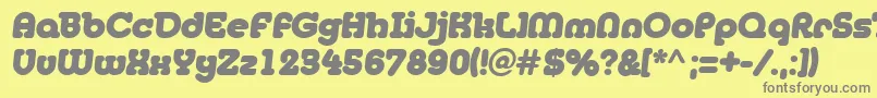 フォントJanis – 黄色の背景に灰色の文字