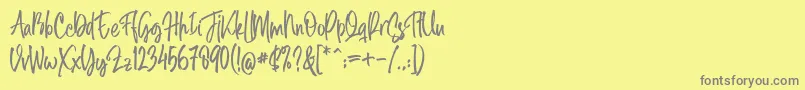Midellion Demoフォントについての詳細 フォントMidellion Demo – 黄色の背景に灰色の文字