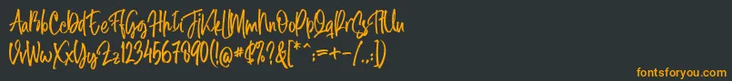 Midellion Demo Font – Orange Fonts on Black Background