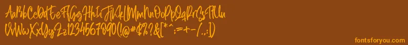 Midellion Demo Font – Orange Fonts on Brown Background