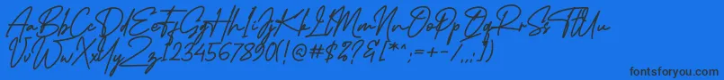 MidlestoneSignature Font – Black Fonts on Blue Background