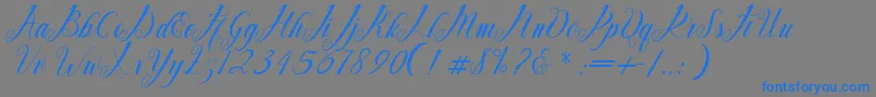 Mighty Free-Schriftart – Blaue Schriften auf grauem Hintergrund