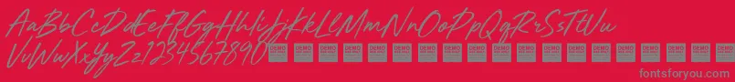 フォントMighty River   Demo – 赤い背景に灰色の文字