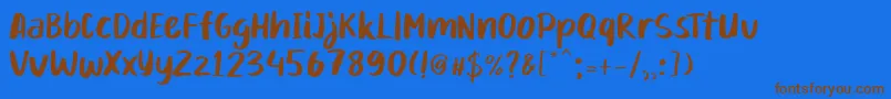 Mikadoby-fontti – ruskeat fontit sinisellä taustalla