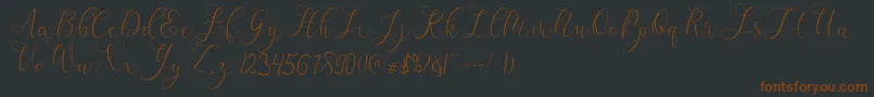 Шрифт mikayla – коричневые шрифты на чёрном фоне