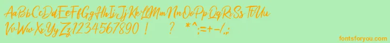 フォントMilea Demo – オレンジの文字が緑の背景にあります。