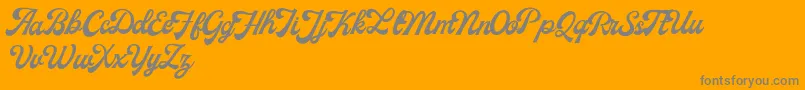 MilestoneFreeVersion Script-Schriftart – Graue Schriften auf orangefarbenem Hintergrund