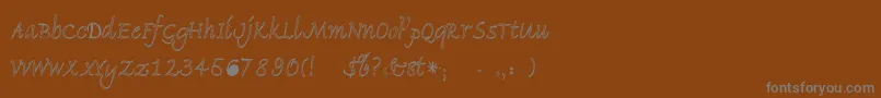 フォントPidemontal – 茶色の背景に灰色の文字