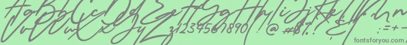 Millanova-Schriftart – Graue Schriften auf grünem Hintergrund
