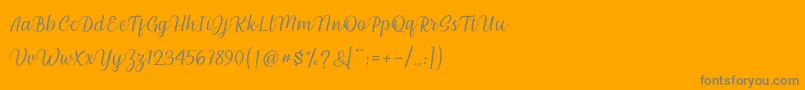 Fonte millenial script – fontes cinzas em um fundo laranja